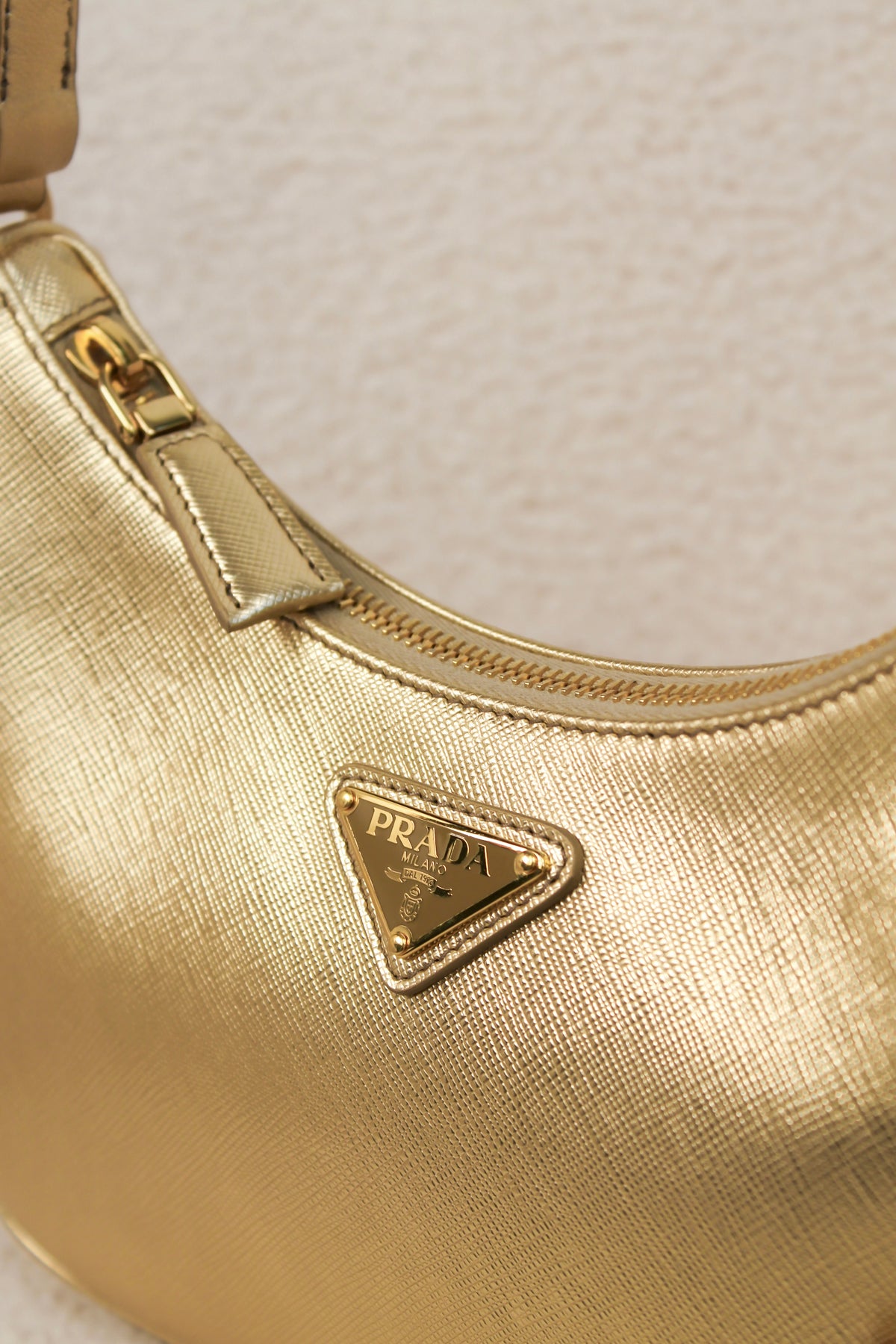 Prada Re-Edition Gold Saffiano Leather Mini Bag