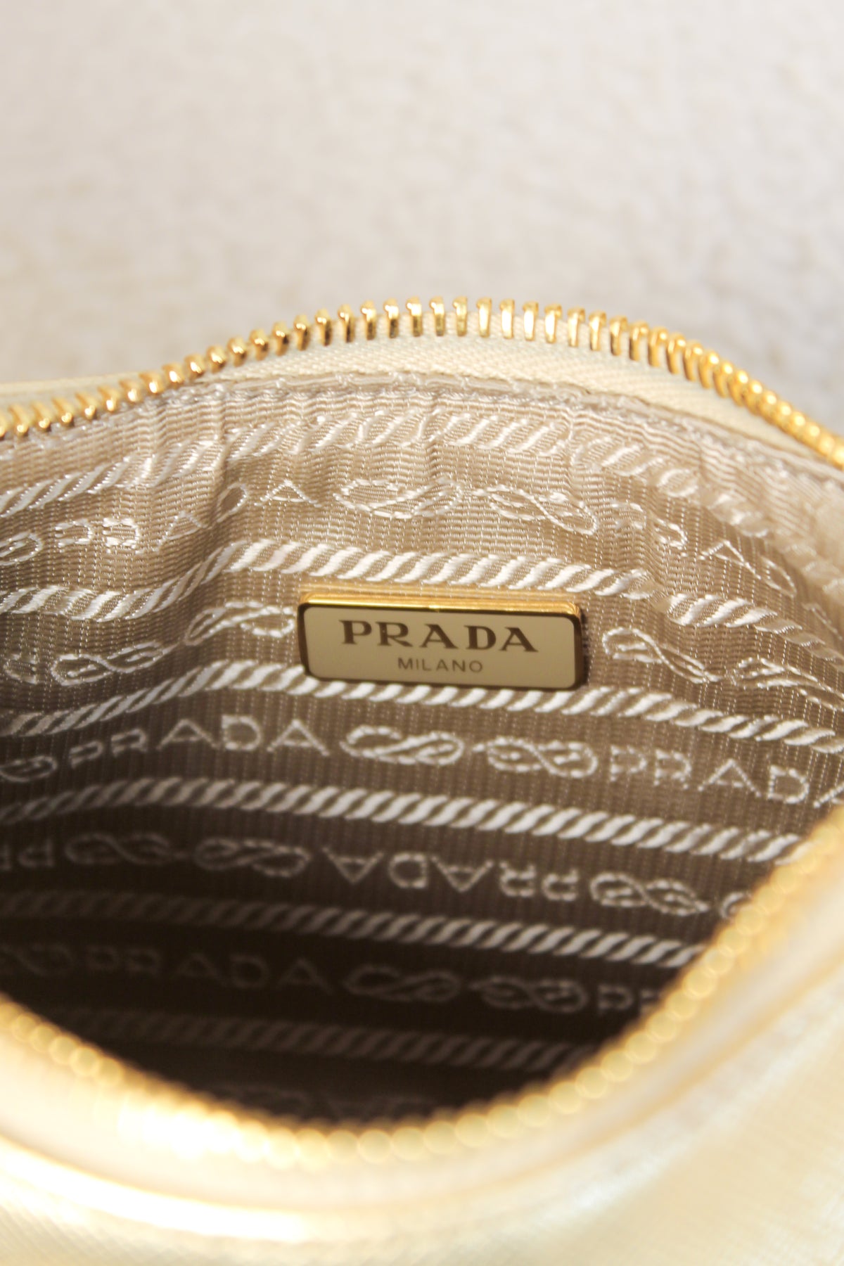 Prada Re-Edition Gold Saffiano Leather Mini Bag
